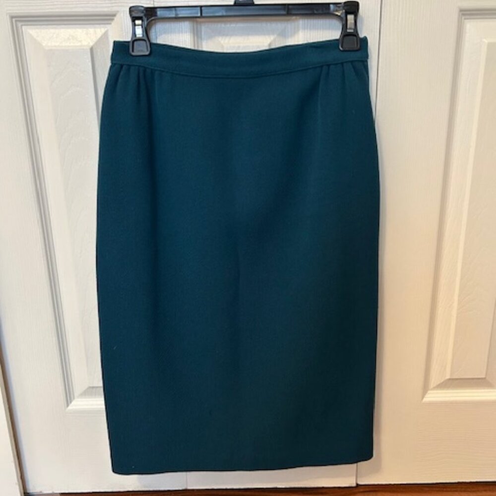 Beautiful vintage teal wool skirt from Simpsons. Waist is 26"